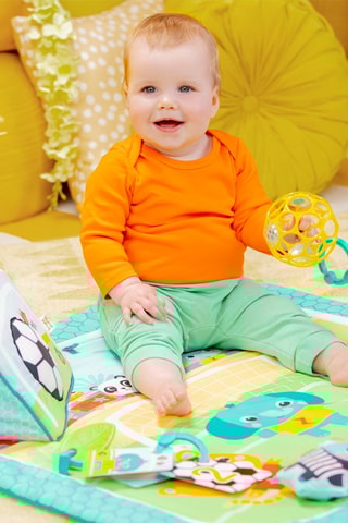 Tapete de desenvolvimento Football - A partir do nascimento