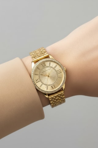 Reloj de cuarzo de acero chapado en ion de oro amarillo