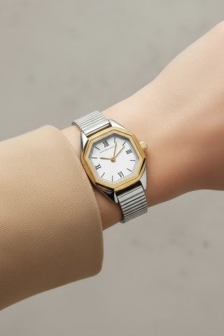 Reloj de cuarzo de acero y chapado en ion de oro amarillo