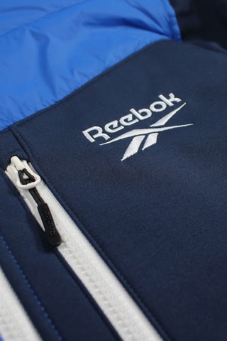  Veste softshell et matelassé Reebok homme - Bleu
