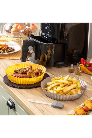 2 cestos de silicone e um pincel 
Cinzento e preto