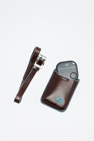 Estojo e dispositivo em couro - Castanho