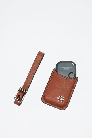 Estojo e dispositivo em couro - Castanho