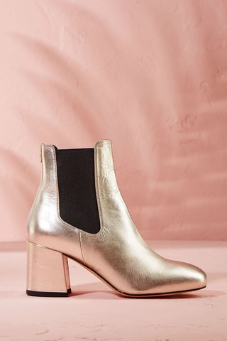 Botins em couro Lacado Dourado