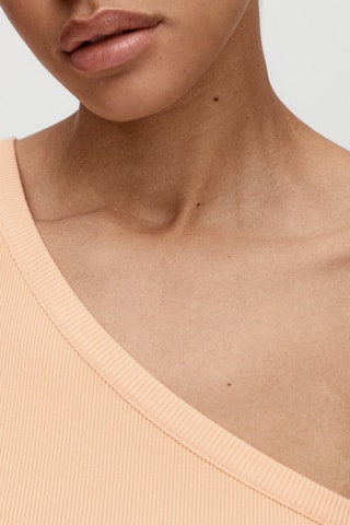 Top décolleté asymétrique - Saumon