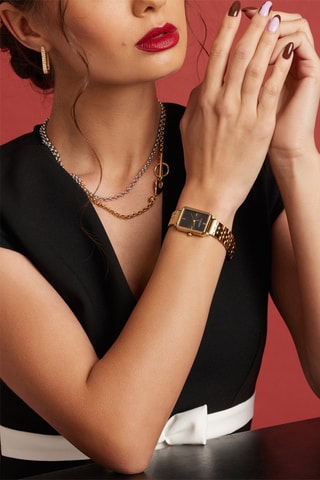 Reloj de cuarzo de acero Carlie - Dorado y negro