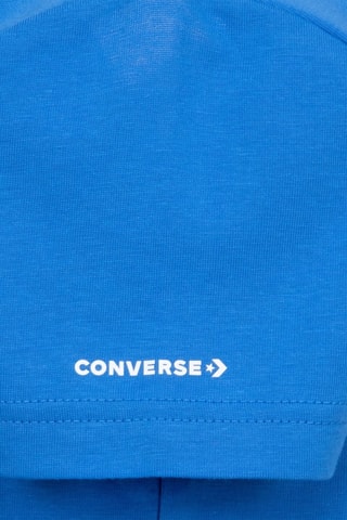 T-shirt e pantaloni sportivi   - Grigio