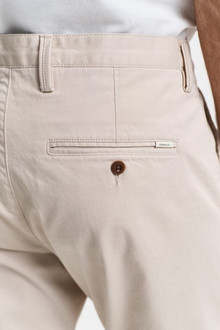 Calças chino slim em algodão biológico - Bege