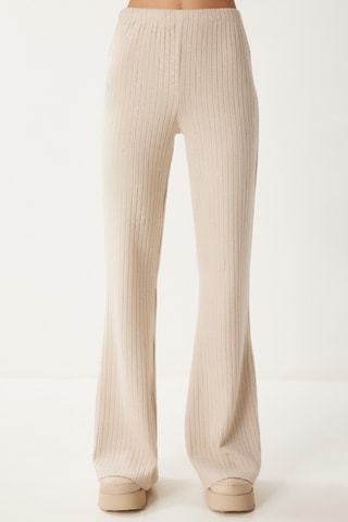 Blusa e calças - Nude