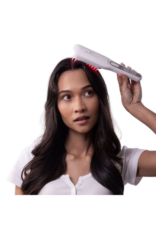 Brosse massante - Lumière rouge