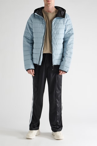 Piumino con cappuccio - Celeste
