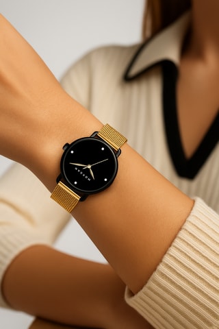 Reloj de cuarzo de acero - Dorado