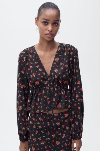 Blouse à fleurs volantée - Noir