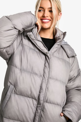 Lange gewatteerde jas met capuchon - Donkergrijs