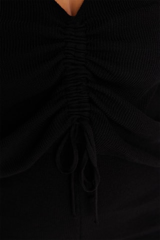 Top y pantalón palazzo - Negro