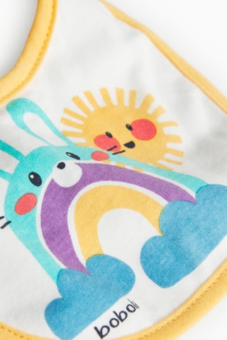 4 bavoirs - Blanc, bleu, jaune et gris