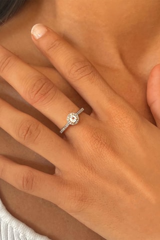 Anillo - Oro blanco, diamantes y topacio