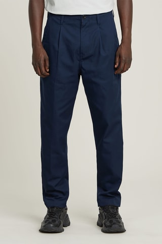 Pantaloni chino relaxed tapered in cotone bio Pleated - Blu scuro