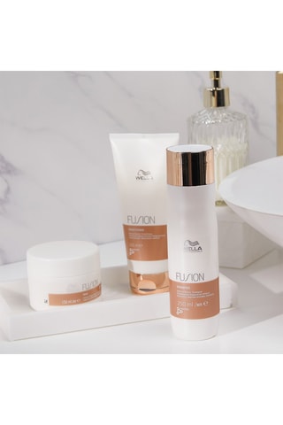 Balsamo riparazione intensa Fusion Wella - Capelli rovinati - 200 ml