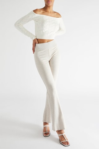 Pantalón flare de tiro alto - Beige