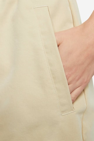 Pantalón de tiro alto Swoosh - Beige