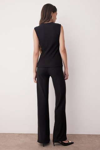 Top e pantaloni - Nero