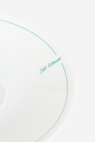 Taza y platillo de porcelana