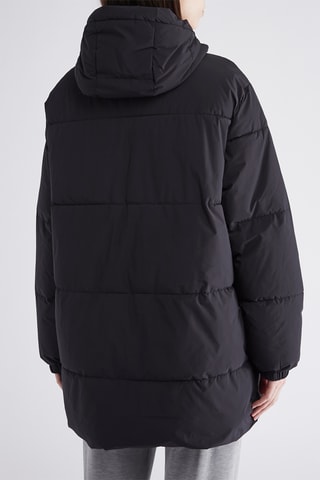 Lange gewatteerde jas met capuchon - Zwart