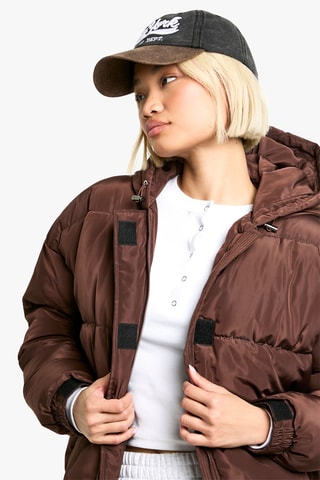 Piumino con cappuccio - Marrone