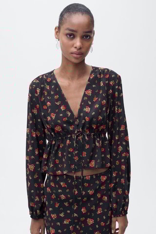 Blouse à fleurs volantée - Noir