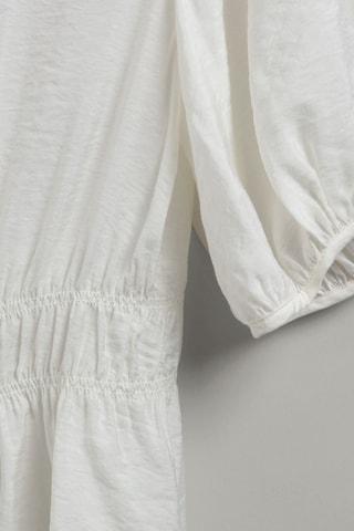 Blusa relaxed - Ecrù