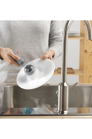 Brosse à vaisselle avec distributeur de savon