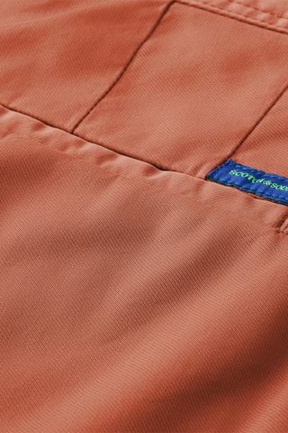 Calças chino de algodão biológico 
Terracota