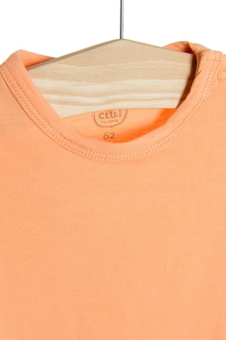 2 combinaisons Orange et blanc