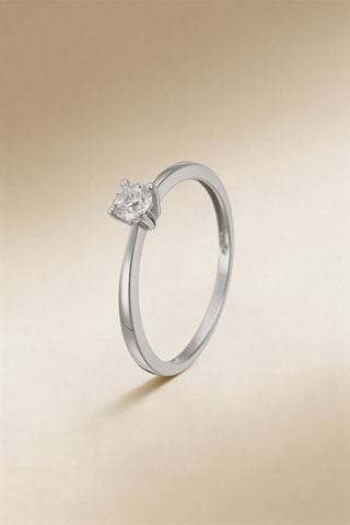 Solitario Clos - 
Oro blanco y diamante