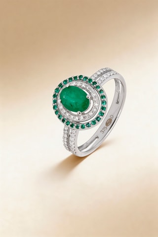 Anillo Dara - Oro blanco, diamantes y esmeraldas