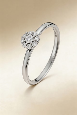 Anillo Camelia - Oro blanco, diamantes y solitario