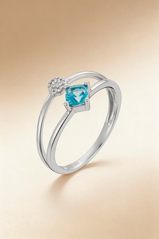 Anillo Orbite - Oro blanco, diamantes y topacio