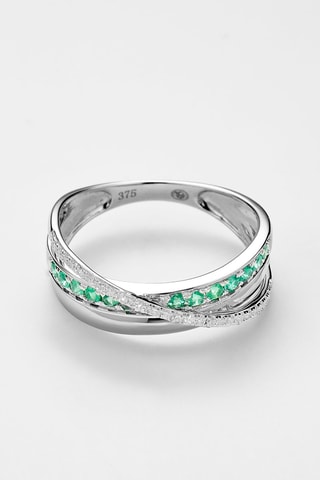 Bague  Or blanc, diamants et émeraudes