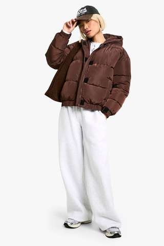 Piumino con cappuccio - Marrone