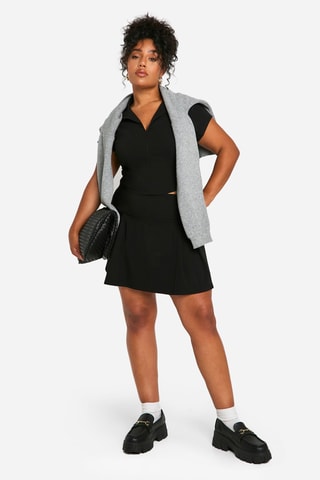 Crop top e gonna plissé a vita alta - Nero