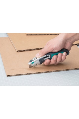 Cúter seguro 2 en 1 con cuchilla trapezoidal Wolfcraft