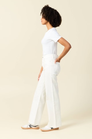 Calças de ganga largos de cintura subida em algodão biológico - Branco