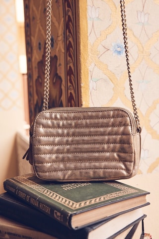 Mala a tiracolo em raspa de couro - Dourado