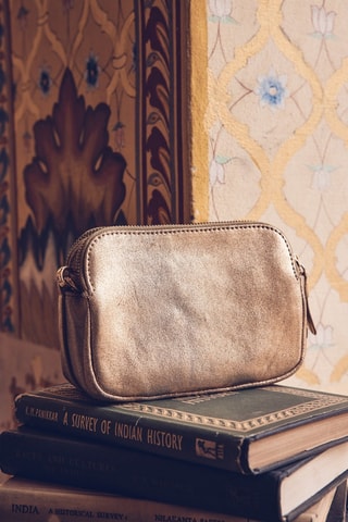 Mala a tiracolo em raspa de couro - Dourado