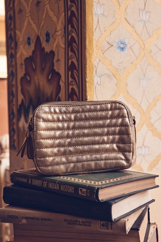 Mala a tiracolo em raspa de couro - Dourado