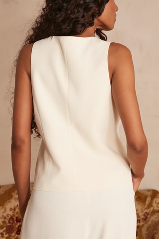 Colete de fato - Cru