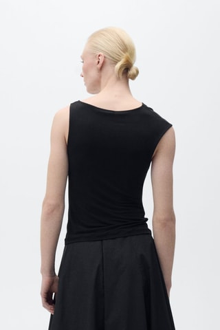 Haut asymétrique application métallique - Noir