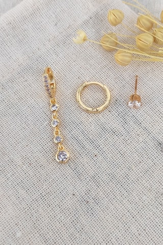 1 boucle d'oreille pendante, 1 puce et 1 créole dorées à l'or fin jaune - Zircons