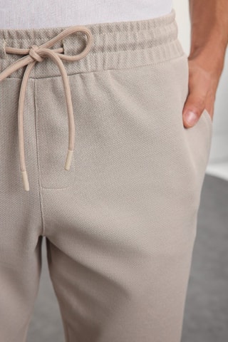 Calças regular - Bege